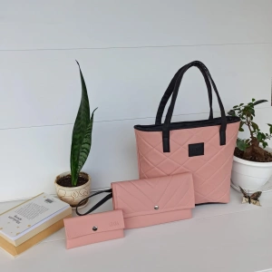 Pink with black set of bag, backpack clutch and purse.