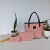 Pink with black set of bag, backpack clutch and purse.