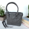 Lovely leather bag with three compartments and a long handle