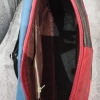 Γνήσια δερμάτινη τσάντα με τρεις τσέπες με φερμουάρ και μια μακριά λαβή