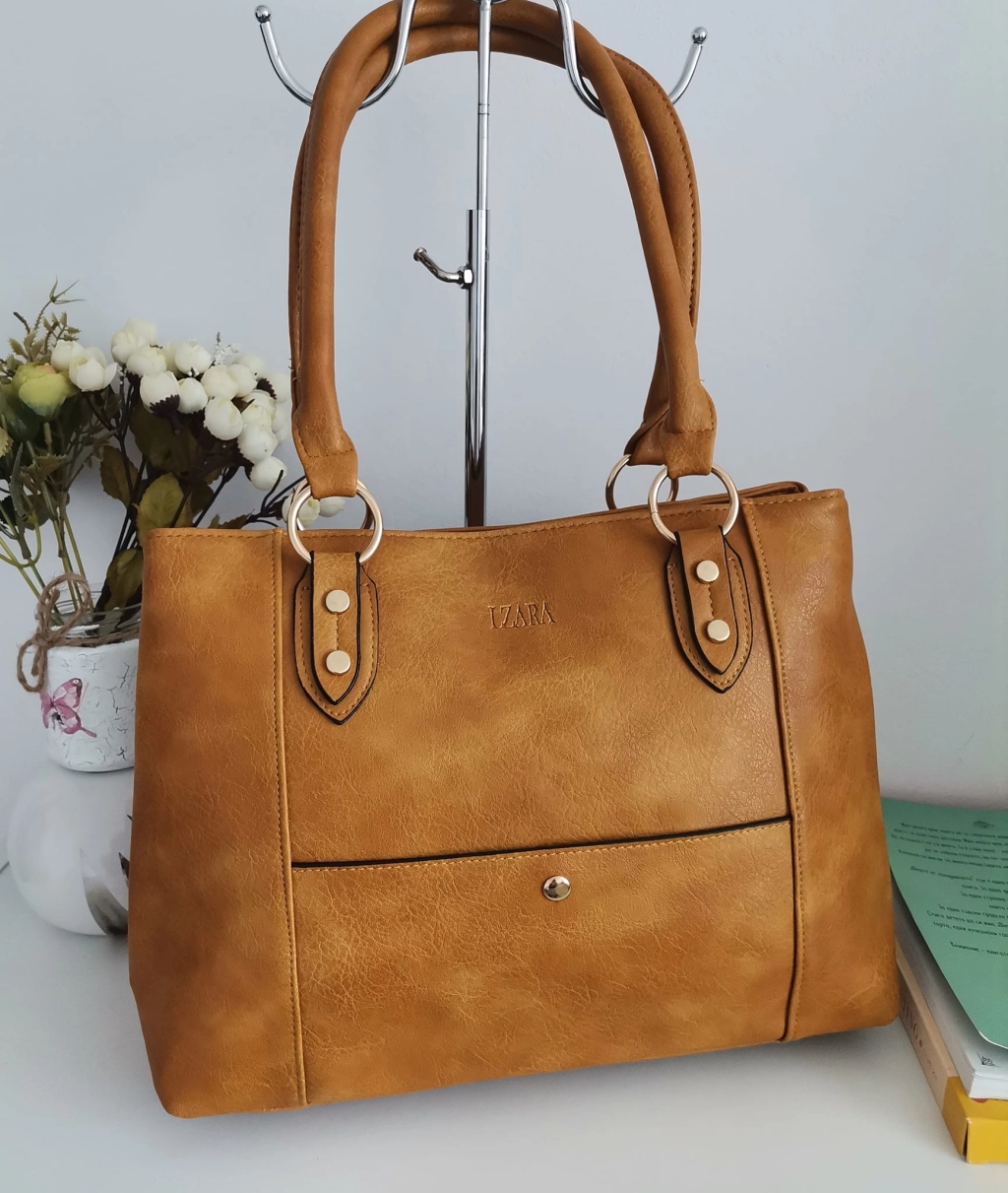 Comfortable leather bag with two compartments with separate zippers and an outer pocket