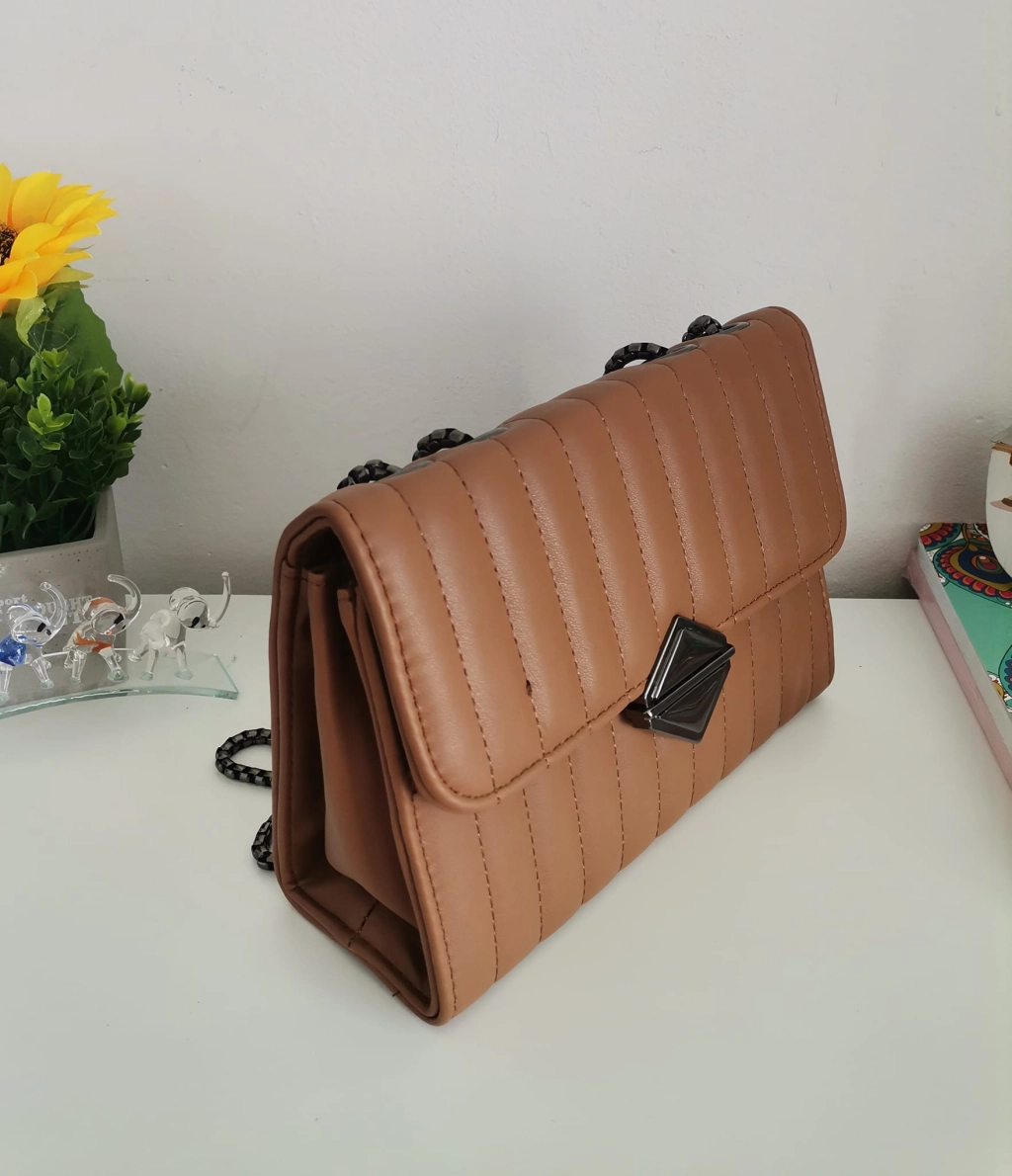 Comfortable leather bag with two compartments with separate zippers and an outer pocket