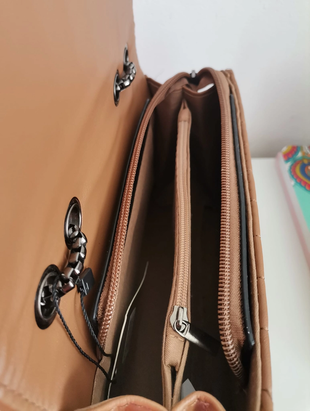 Comfortable leather bag with two compartments with separate zippers and an outer pocket