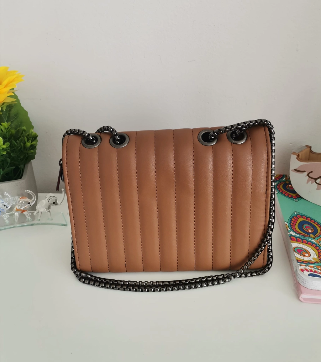 Comfortable leather bag with two compartments with separate zippers and an outer pocket