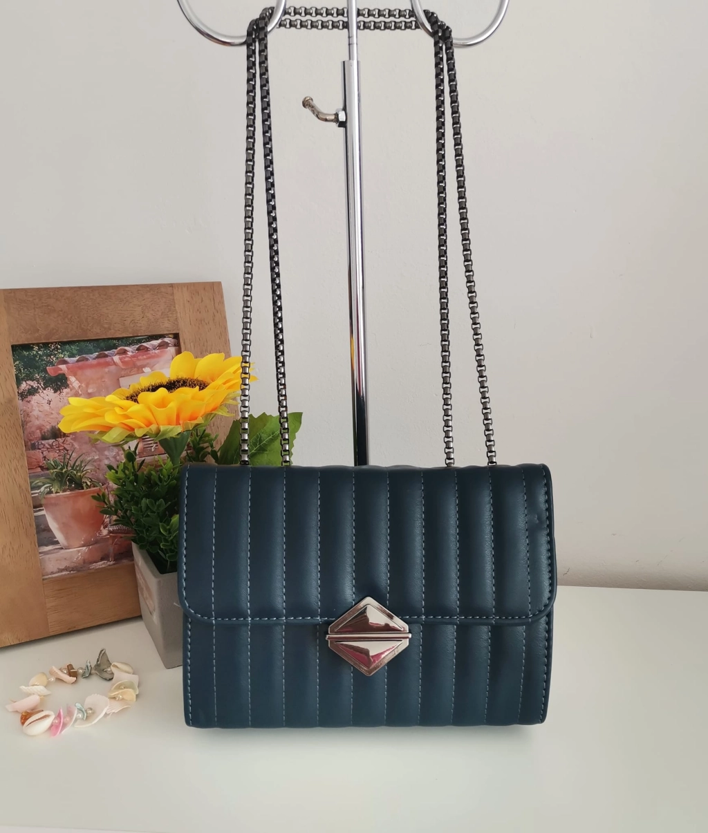 Comfortable leather bag with two compartments with separate zippers and an outer pocket