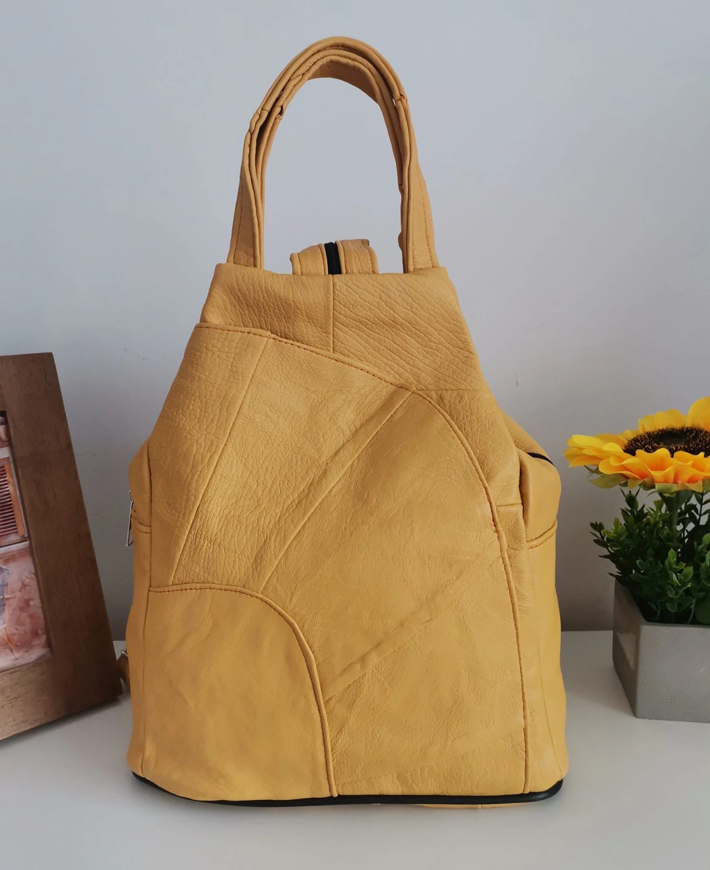 Genuine leather backpack with many pockets