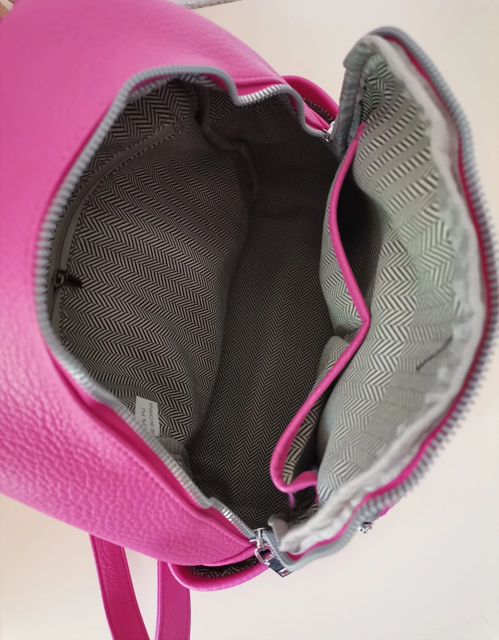 Comfortable backpack - bag with zipper on the back handles, short handles and pockets