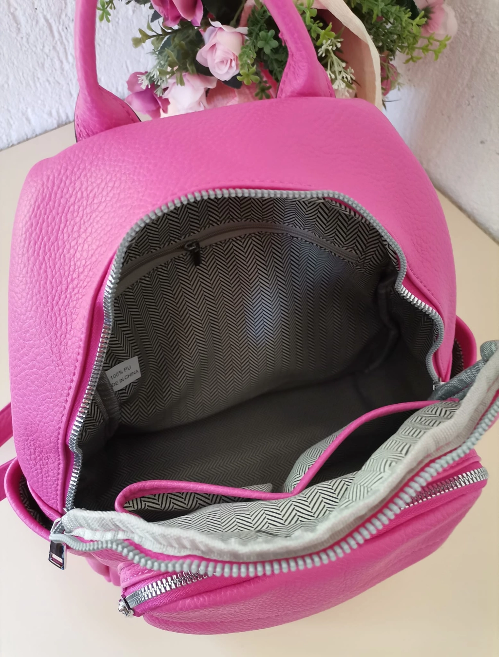 Comfortable backpack - bag with zipper on the back handles, short handles and pockets