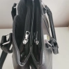 Comfortable leather bag with two compartments with separate zippers and an outer pocket