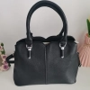 Comfortable leather bag with two compartments with separate zippers and an outer pocket