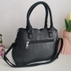 Comfortable leather bag with two compartments with separate zippers and an outer pocket