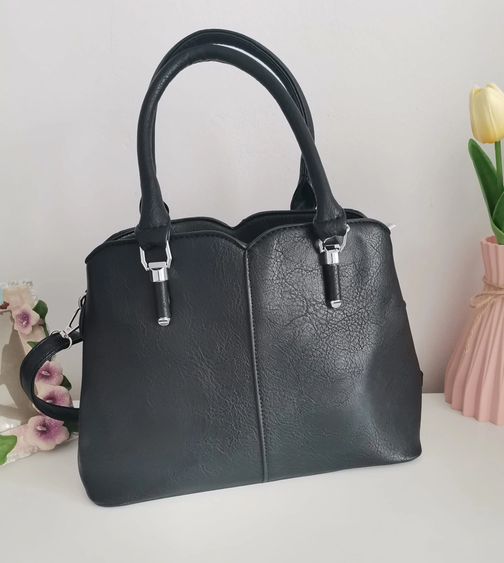 Comfortable leather bag with two compartments with separate zippers and an outer pocket