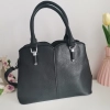 Comfortable leather bag with two compartments with separate zippers and an outer pocket