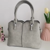 Comfortable leather bag with two compartments with separate zippers and an outer pocket