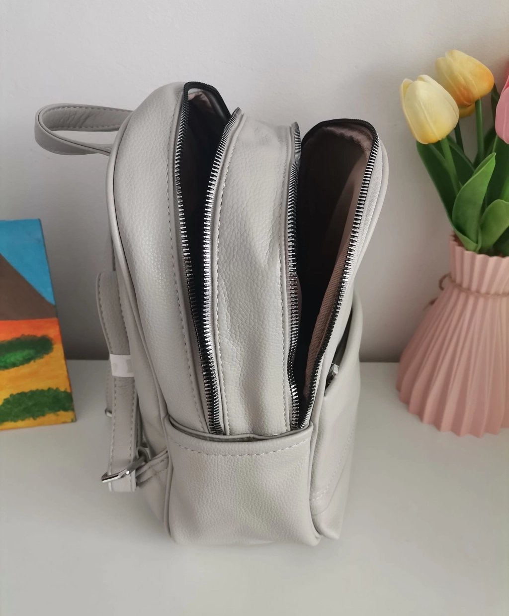 Comfortable backpack - bag with zipper on the back handles, short handles and pockets