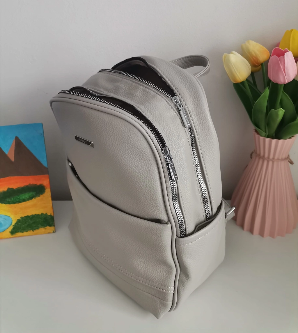 Comfortable backpack - bag with zipper on the back handles, short handles and pockets