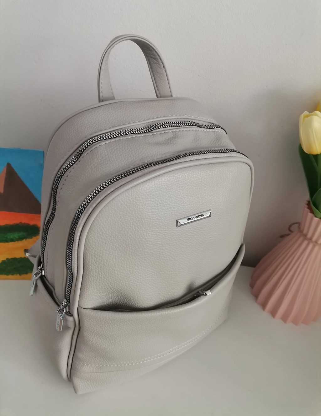 Comfortable backpack - bag with zipper on the back handles, short handles and pockets