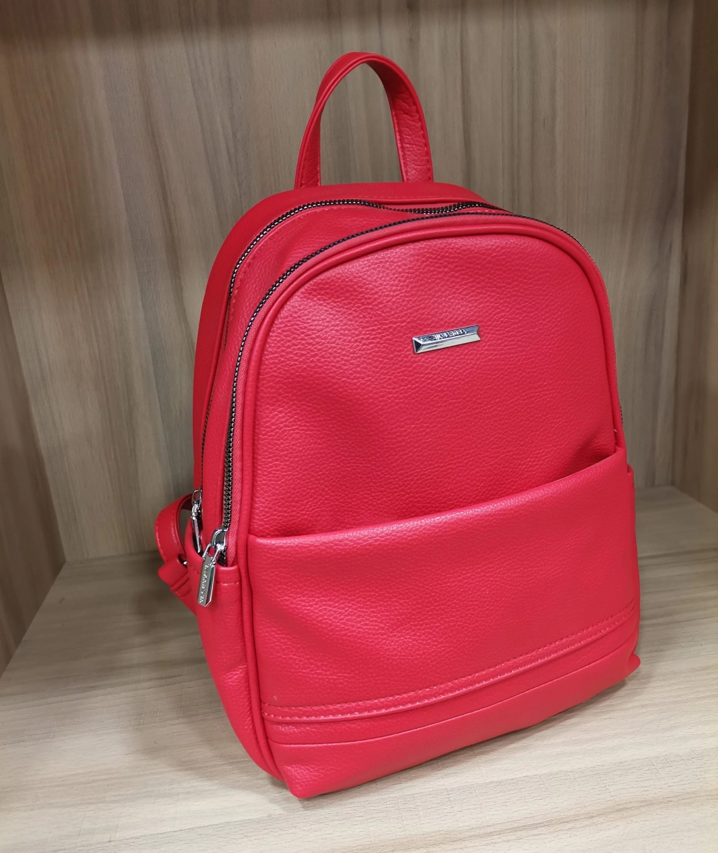 Comfortable backpack - bag with zipper on the back handles, short handles and pockets