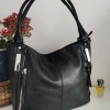 Comfortable large leather bag with three compartments with internal and external pockets