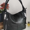 Comfortable large leather bag with three compartments with internal and external pockets