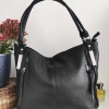 Comfortable large leather bag with three compartments with internal and external pockets