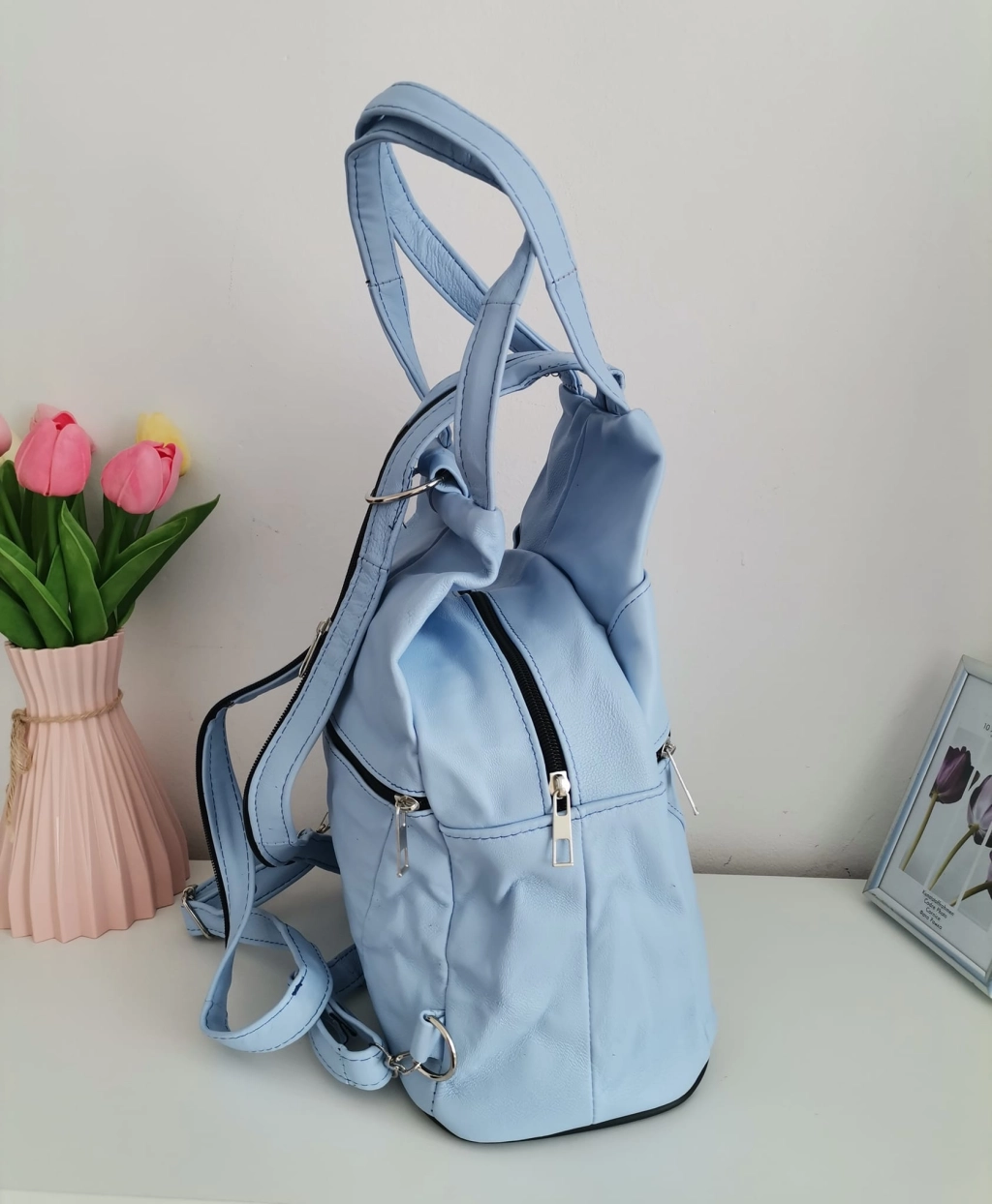 Genuine leather backpack with many pockets