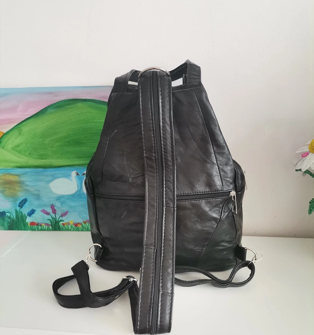 Genuine leather backpack with many pockets