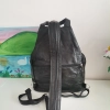 Genuine leather backpack with many pockets