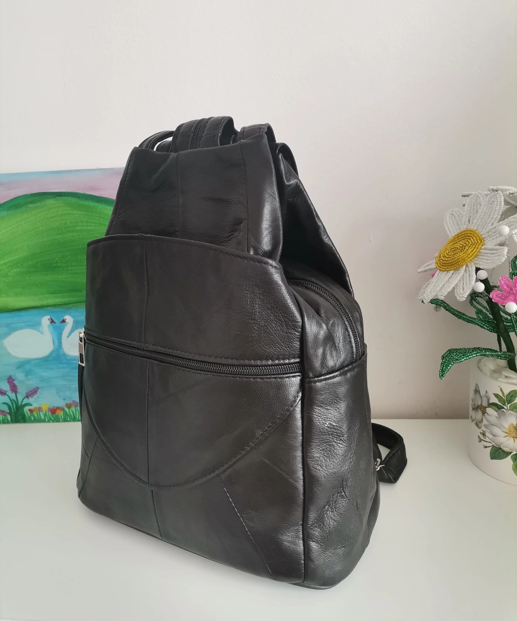 Genuine leather backpack with many pockets