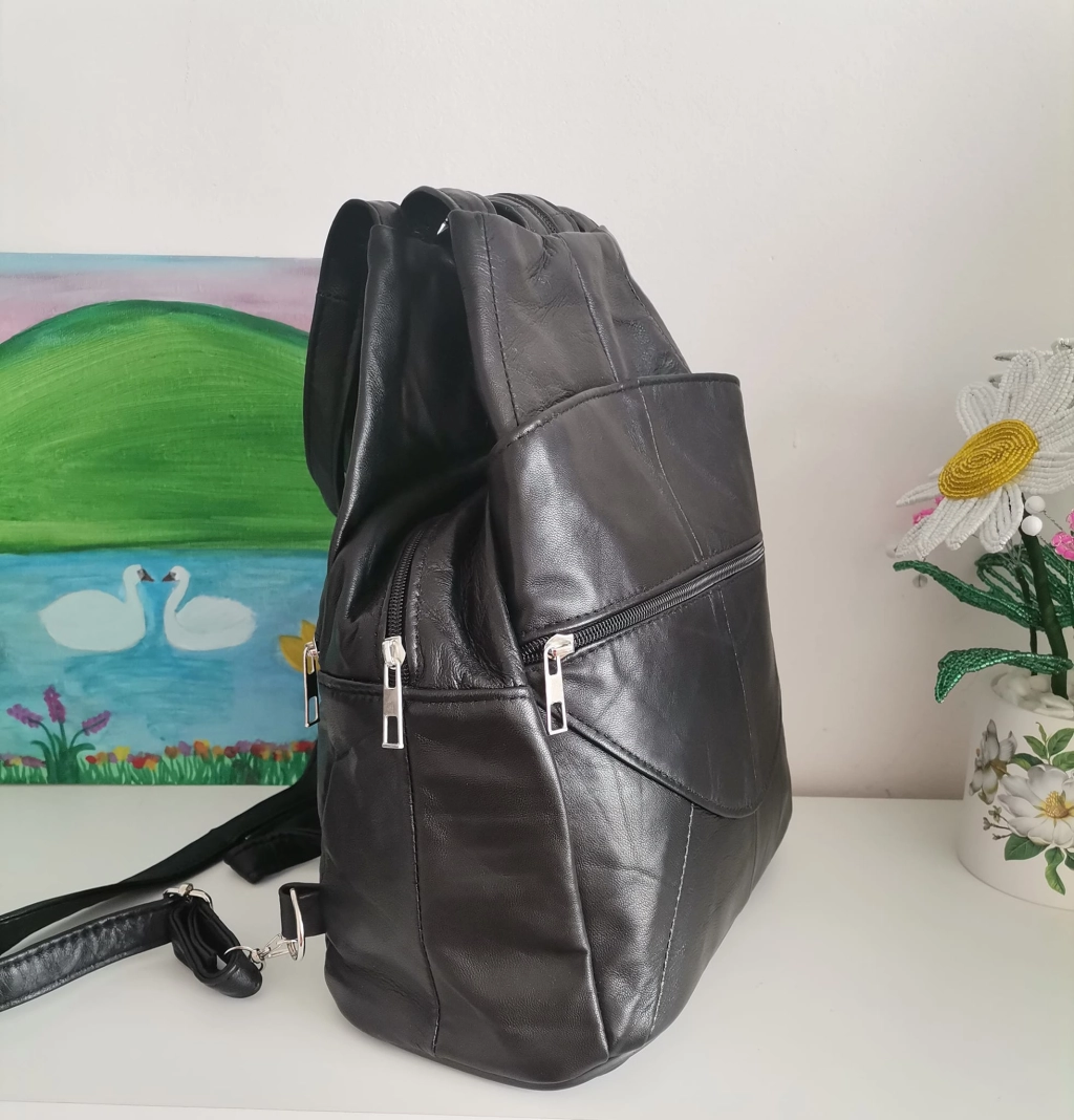 Genuine leather backpack with many pockets