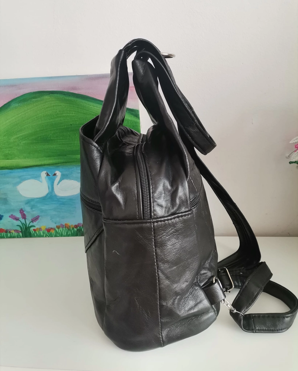 Genuine leather backpack with many pockets