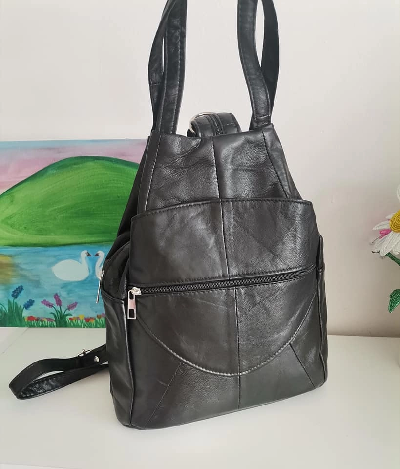 Genuine leather backpack with many pockets