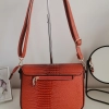 Comfortable leather bag with two compartments with separate zippers and an outer pocket