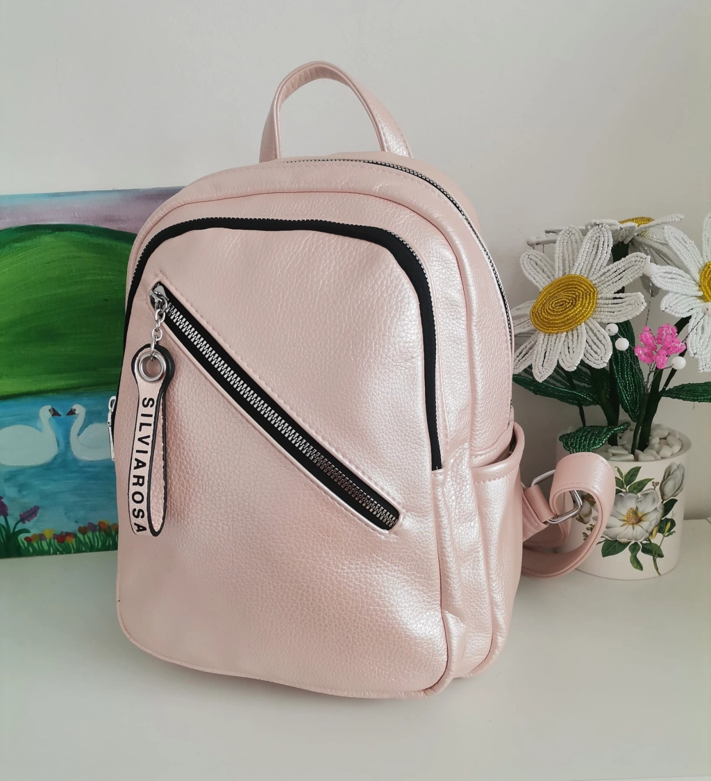 Comfortable backpack - bag with zipper on the back handles, short handles and pockets