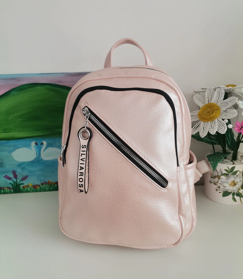 Comfortable backpack - bag with zipper on the back handles, short handles and pockets