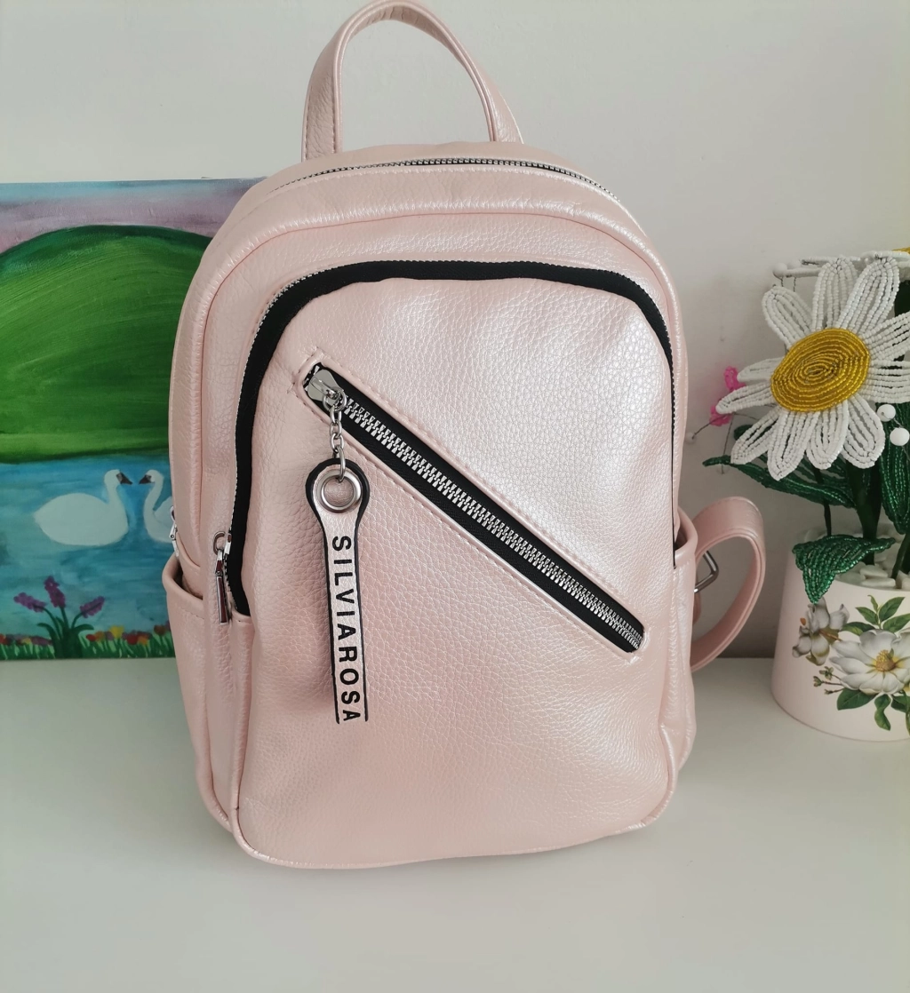 Comfortable backpack - bag with zipper on the back handles, short handles and pockets