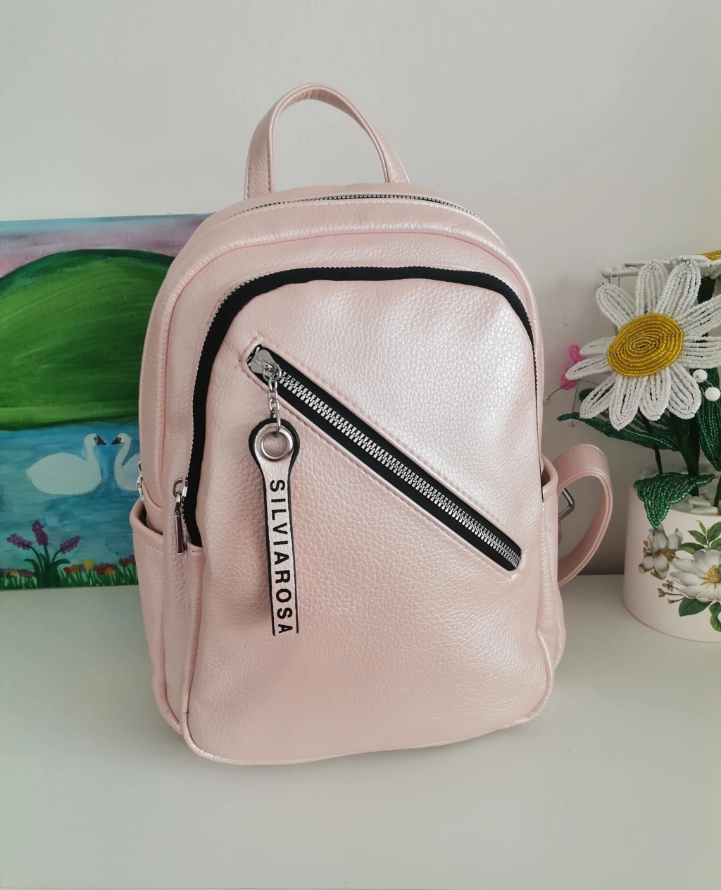 Comfortable backpack - bag with zipper on the back handles, short handles and pockets