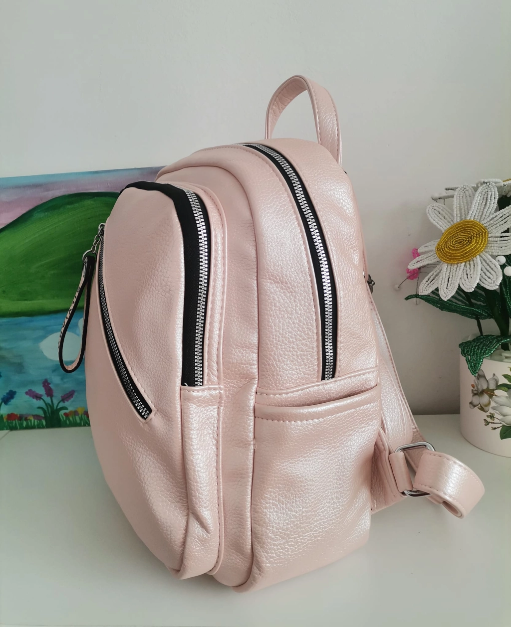 Comfortable backpack - bag with zipper on the back handles, short handles and pockets