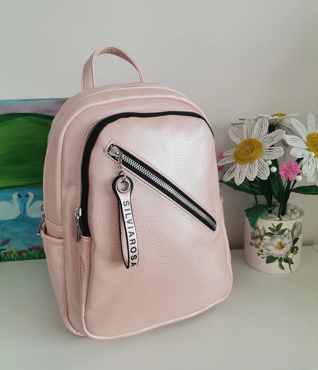 Comfortable backpack - bag with zipper on the back handles, short handles and pockets