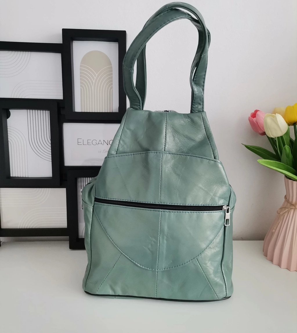 Genuine leather backpack with many pockets