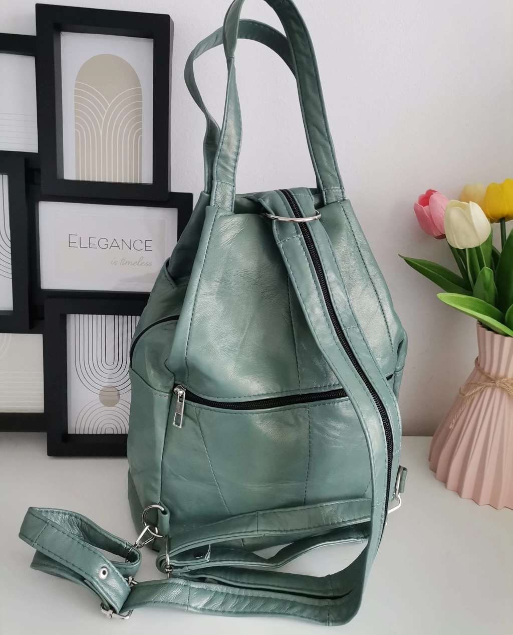 Genuine leather backpack with many pockets