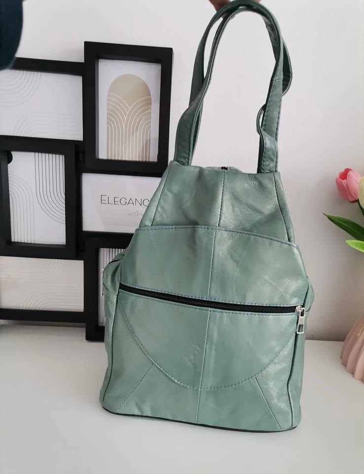 Genuine leather backpack with many pockets