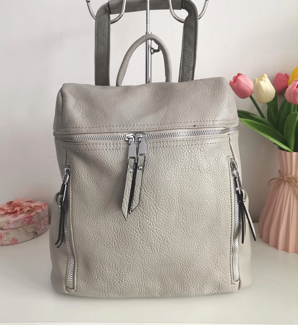 Comfortable backpack - bag with zipper on the back handles, short handles and pockets