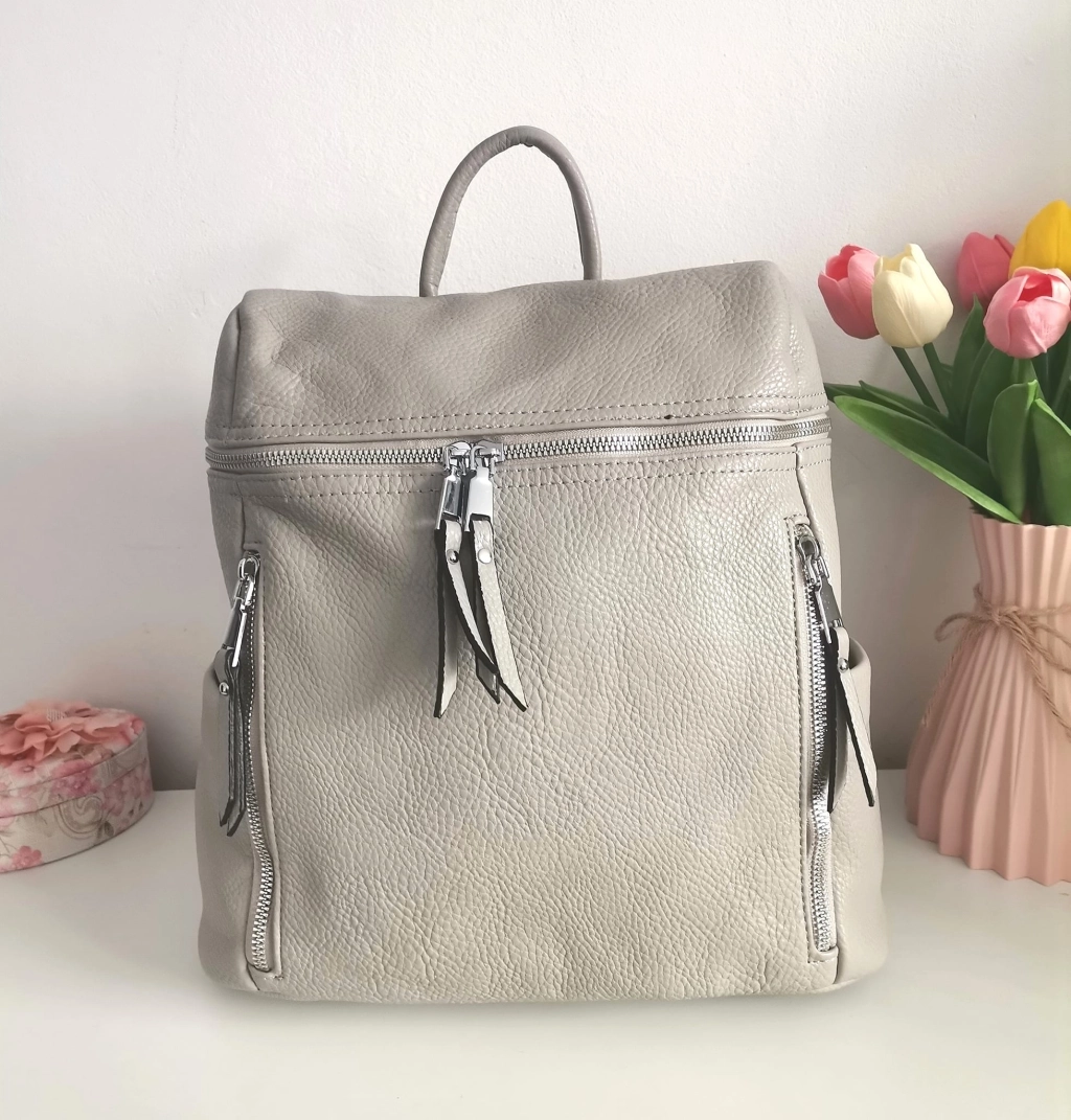 Comfortable backpack - bag with zipper on the back handles, short handles and pockets