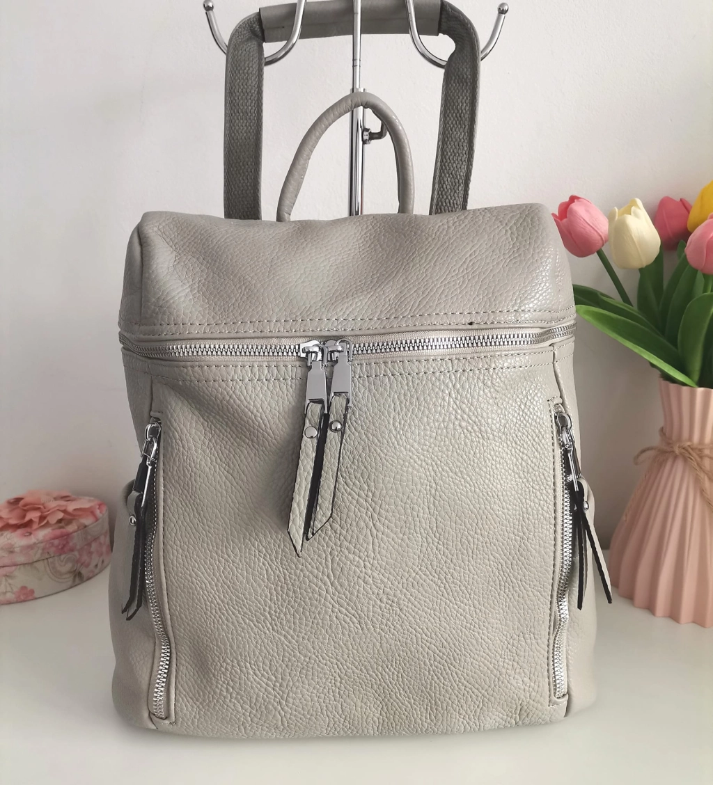 Comfortable backpack - bag with zipper on the back handles, short handles and pockets