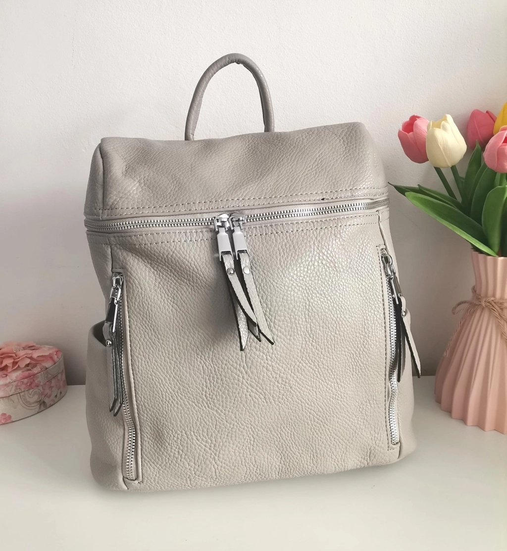 Comfortable backpack - bag with zipper on the back handles, short handles and pockets