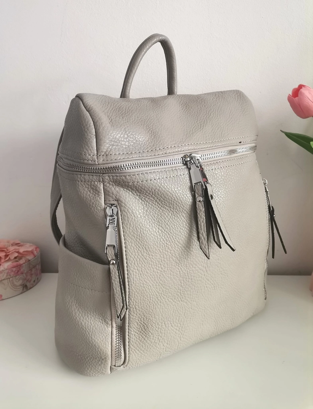 Comfortable backpack - bag with zipper on the back handles, short handles and pockets