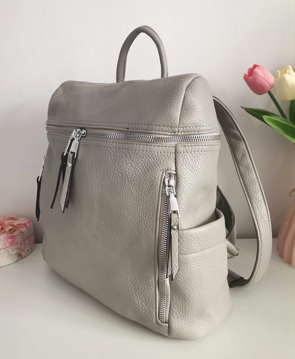 Comfortable backpack - bag with zipper on the back handles, short handles and pockets