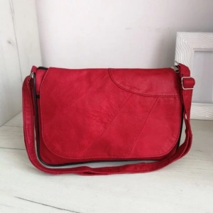 Red genuine leather bag with three pockets and a long handle