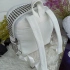 Large white leather backpack with many pockets